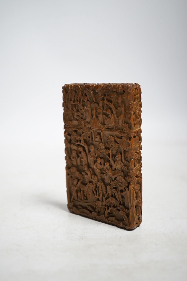 A 19th century Chinese ornately carved sandalwood card case, 11cm high. Condition - good